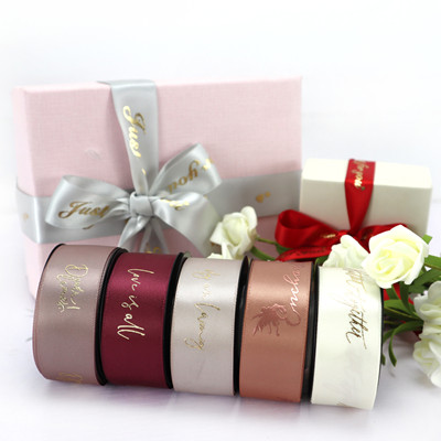 Customized gold and silver foil grosgrain ribbon printing.400